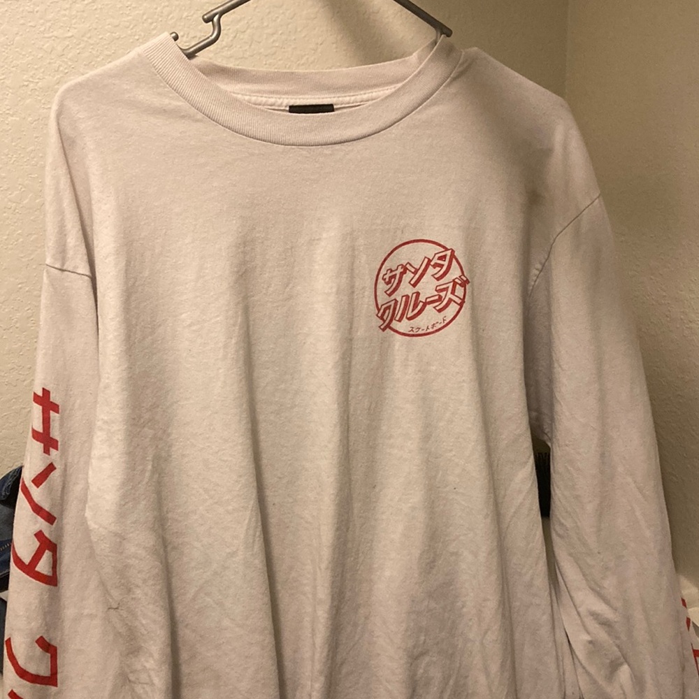 White longe sleeve shirt with red writing